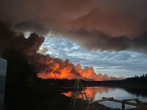 A First Nation reserve and nearby town in the southern Northwest Territories have been evacuated as a wildfire spreads in the area.
