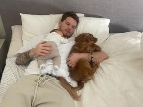 Leafs goaltender Ilya Samsonov relaxes with baby Miroslav and his dog on a recent day off.