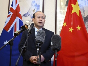 China's Ambassador to Australia Xiao Qian speaks to media at the Embassy of China in Canberra, Thursday, May 18, 2023. Xiao asked Australian authorities Thursday to increase efforts to find survivors in an Indian Ocean search for 39 missing from a capsized Chinese fishing boat.