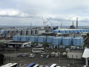 FILE - This photo shows some of about 1,000 huge tanks holding treated but still radioactive wastewater at the Fukushima Daiichi nuclear power plant, operated by Tokyo Electric Power Company Holdings (TEPCO), in Okuma town, northeastern Japan, on Feb. 22, 2023. An International Atomic Energy Agency team arrived in Tokyo on Monday, May 29, 2023, for a final review before Japan begins releasing massive amounts of treated radioactive water into the sea from the wrecked Fukushima nuclear plant, a plan that has been strongly opposed by local fishing communities and neighboring countries.