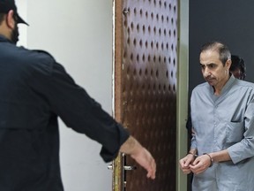 In this photo released by Mizan News Agency on Oct. 25, 2022, Iranian-Swedish dual national Farajollah Cha'ab arrives at a courtroom at the Revolutionary Court in Tehran, Iran. Iran executed Cha'ab Saturday, May, 6, 2023, accused of masterminding a 2018 attack on a military parade that killed at least 25 people, one of several enemies of Tehran seized abroad in recent years amid tensions with the West.