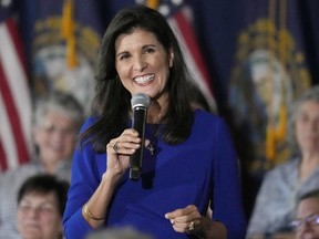 FILE - Republican presidential candidate Nikki Haley smiles while taking a question from the audience during a campaign gathering, Wednesday, May 24, 2023, in Bedford, N.H.