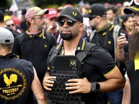 FILE - Proud Boys chairman Enrique Tarrio rallies in Portland, Ore., on Aug. 17, 2019. A federal jury is scheduled to hear a second day of attorneys' closing arguments in the landmark trial for former Proud Boys extremist group leaders charged with plotting to violently stop the transfer of presidential power after the 2020 election.