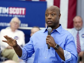FILE - Sen. Tim Scott, R-S.C., speaks at a town hall, Sunday, April 30, 2023, in Charleston, S.C. Scott filed paperwork with the Federal Election Commission declaring his intention to seek his party's nomination in 2024.