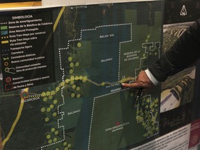 FILE - Rogelio Jiménez Pons, director of Fonatur, points to a map of a planned tourist train line through the Yucatan Peninsula known as the Maya Train, during an interview in Mexico City, March 18, 2019. Mexico's Supreme Court ruled Thursday, May 18, 2023, the government cannot simply decree that tourist trains or other public work projects are issues of "national security," because that violates the public's right to information.