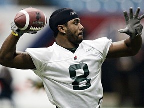 Edmonton running back Dahrran Diedrick tosses the ball during a practice Friday, Nov. 25, 2005 in Vancouver.&ampnbsp;Former CFL and NFL running back Dahrran Diedrick has died, the Montreal Alouettes announced Saturday. THE CANADIAN&ampnbsp; PRESS/Chuck Stoody
