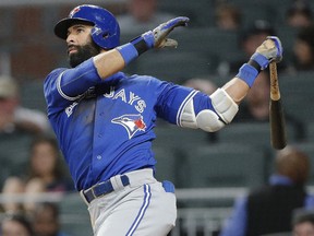 Jose Bautista swings the bat