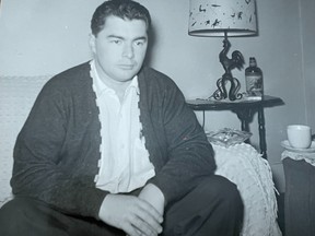 Black and white photo of Howard Halpenny