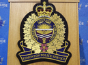 An Edmonton Police Service logo is shown at a press conference in Edmonton, Oct. 2, 2017.