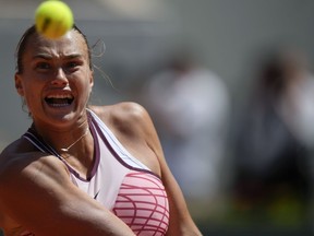 Aryna Sabalenka of Belarus eyes the ball as she plays a shot against Russia's Kamilla Rakhimova during their third round match of the French Open tennis tournament at the Roland Garros stadium in Paris, Friday, June 2, 2023.