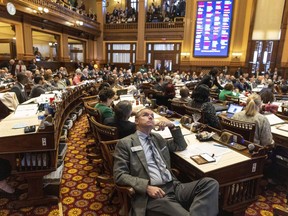 FILE - A view of the House of Representatives in Atlanta, following the passage of SB 140 on Thursday, March 16, 2023. SB 140 limits treatment for transgender youth. Lawyers for parents of four transgender children said they have filed a lawsuit challenging a Georgia law that bans most gender-affirming surgeries and hormone replacement therapies for transgender people under 18. The law is set to take effect Saturday, July 1.