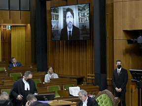 Prime Minister Justin Trudeau is seen on a videoconference display in the House of Commons