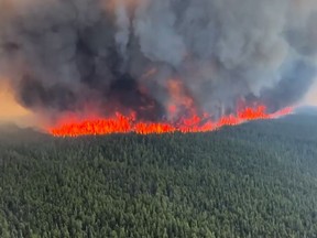 The West Kiskatinaw River wildfire (G70645) burns in the District of Tumbler Ridge, B.C. in this Thursday, June 8, 2023 handout image provided by the BC Wildfire Service. Fire officials are hoping a wind change will help save the community of Tumbler Ridge in northeastern British Columbia, after the wildfire pushed within a few kilometres of the town.THE CANADIAN PRESS/HO, BC Wildfire Service *MANDATORY CREDIT*