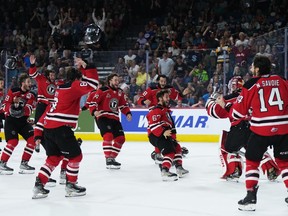 The Quebec Remparts celebrate after defeating the Seattle Thunderbirds in Memorial Cup final hockey action, in Kamloops, B.C., on Sunday, June 4, 2023.
