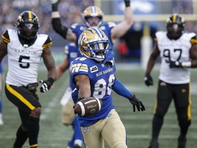 Winnipeg Blue Bombers' Rasheed Bailey (88) crosses the line for the touchdown against the Hamilton Tiger-Cats during first half CFL action in Winnipeg Friday, June 9, 2023.