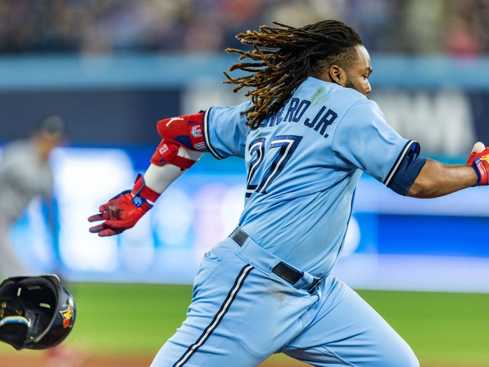 Vladimir Guerrero Jr. 27 Toronto Blue Jays baseball player action