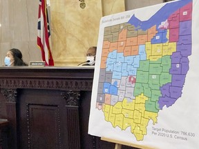 FILE - Members of the Ohio Senate Government Oversight Committee hear testimony on a new map of state congressional districts onNov. 16, 2021, at the Ohio Statehouse in Columbus, Ohio. The Ohio Supreme Court will take yet another look at the legality of the state's congressional districts after the U.S. Supreme Court on Friday, June 30, 2023, set aside a ruling striking down the districts and ordered further consideration of the case.