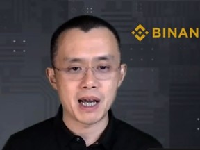 FILE - Binance CEO Changpeng Zhao answers a question during a Zoom meeting interview with The Associated Press on Nov. 16, 2021. Binance and its founder Changpeng Zhao are accused of misusing investor funds, operating as an unregistered exchange and violating a slew of U.S. securities laws in a lawsuit filed by the SEC. Filed in the U.S. District Court for the District of Columbia, the Securities and Exchange Commission lawsuit on Monday, June 5, 2023 lists thirteen charges against the firm -- including commingling and divert customer assets to an entity Zhao owned called Sigma Chain. (AP Photo, File)