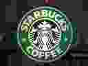 FILE - The Starbucks sign is displayed in the window of a Pittsburgh Starbucks, Jan. 30, 2023.