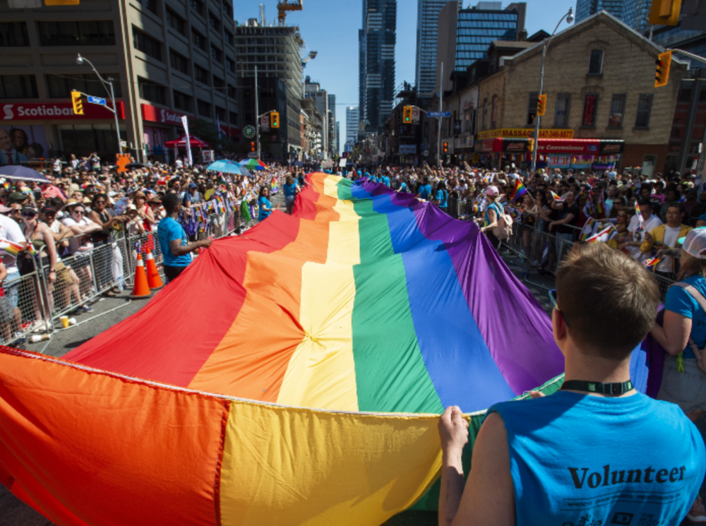 Large crowds pack Toronto streets as Canada's largest Pride parade ...