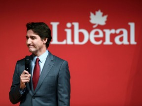 Prime Minister Justin Trudeau at an event for Liberal supporters in 2022. Past Liberal voters appear to be seeking out other parties amid the higher cost of living, a poll shows.
