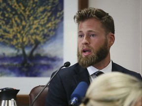 FILE - Owen Shroyer, an InfoWars host and sometimes reporter who is a frequent guest on the Alex Jones Show, testifies during Jones' defamation damages trial at the Travis County Courthouse, July 29, 2022, in Austin, Texas. Infowars host Owen Shroyer, who promoted baseless claims of 2020 election fraud on the far-right internet platform, pleaded guilty on Friday, June 23, 2023, to joining the mob of Donald Trump supporters who rioted at the U.S. Capitol.