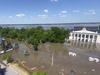 In this handout photo taken from video released by Russian-controlled administration of Kherson Region on Wednesday, June 7, 2023, the central square of Nova Kakhovka is flooded after the Kakhovka dam was blown up, in the Russian-controlled part of the Kherson Region, Ukraine.