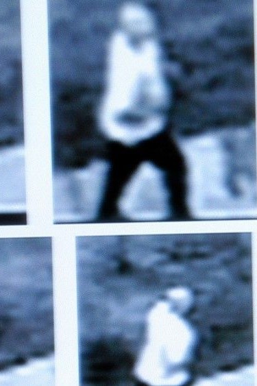 Images from a security tape show an SUV similar to Liana White's driving past at 4:50 a.m. on July 12 and a man jogging in the opposite direction about 11 minutes later