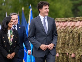 Justin Trudeau (R) and Canadian defence minister Anita Anand