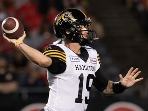 Hamilton Tiger-Cats quarterback Bo Levi Mitchell attempts a pass during first half CFL action against the Ottawa Redblacks, Friday, July 28, 2023 in Ottawa.