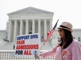 An anti-affirmative action activist rallies outside the U.S. Supreme Court on June 29, 2023, in Washington, D.C.