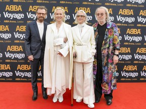 Björn Ulvaeus, left, Agnetha Fältskog, Anni-Frid Lyngstad and Benny Andersson attend the first performance of ABBA’s Voyage at ABBA Arena in 2022 in London, England.