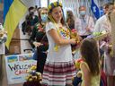 Ukrainian refugees are welcomed at Pierre Trudeau airport in Montreal in May 2022.