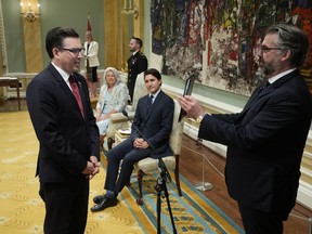 Minister of Citizens' Services Terry Beech takes the oath during a cabinet swearing-in ceremony at Rideau Hall in Ottawa on Wednesday, July 26, 2023.