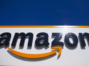 FILE - The Amazon logo is seen in Douai, northern France, April 16, 2020. Amazon is disputing its status as an online platform subject to stricter scrutiny under new European Union digital rules that are set to take effect next month. The ecommerce giant filed a legal challenge with a top European Union court, arguing it's being treated unfairly by being designated a "very large online platform" under the 27-nation bloc's pioneering Digital Services Act.