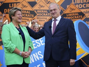 Britain's newly elected Liberal Democrat MP Sarah Dyke, left, is congratulated by party leader Ed Davey after she won the Somerton and Frome by-election, in Frome, Somerset, England, Friday, July 21, 2023. Britain's governing Conservative Party has suffered two thumping defeats in a trio of special elections but avoided a drubbing after holding onto former premier Boris Johnson's seat in suburban London. Though the main opposition Labour Party and the smaller centrist Liberal Democrats overturned massive Conservative majorities in Thursday's elections to win a seat apiece, the Conservatives found some crumbs of comfort in their narrow success in Uxbridge and South Ruislip in west London.
