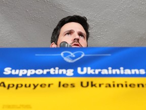 Minister of Immigration, Refugees and Citizenship, Sean Fraser makes an announcement at the Cafe Ukraine in Ottawa on Wednesday, March 22, 2023.