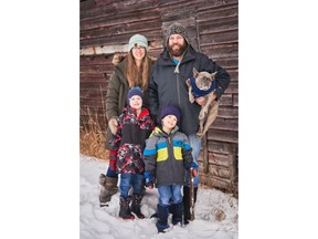 Carlyn and Ryan Gould and their sons Gus and Evan are shown in this undated handout photo. Ryan Gould, who died in a helicopter crash while fighting a forest fire in northern Alberta, is being remembered as a man with unforgettable humour.
