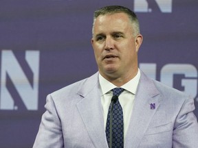 FILE - Northwestern head coach Pat Fitzgerald talks to reporters during an NCAA college football news conference at the Big Ten Conference media days, at Lucas Oil Stadium, Tuesday, July 26, 2022, in Indianapolis. Northwestern has suspended coach Pat Fitzgerald for two weeks without pay following an investigation into alleged hazing within the football program. Fitzgerald started serving his suspension on Friday, July 7, 2023.