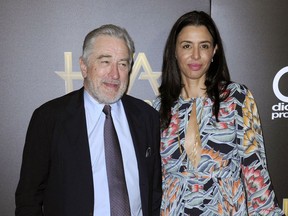 FILE - Robert De Niro, left, and his daughter Drena De Niro appear at the 20th annual Hollywood Film Awards in Beverly Hills, Calif., on Nov. 6, 2016. Leandro De Niro Rodriguez, a grandson of Robert De Niro and Diahnne Abbott, has died at 19. His mother, Drena De Niro, announced the news Monday in an Instagram post.