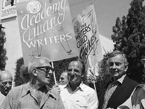 FILE - Oscar-winning writers, from left, Richard Brooks, Bo Goldman, and Gore Vidal join members of the Writers Guild of America during a massive picket outside the 20-Century Fox studios in Los Angeles on June 25, 1981. Goldman, who penned the Oscar-winning scripts to "One Flew Over the Cuckoo's Nest" and "Melvin and Howard" and whose textured, empathy-rich screenplays made him one of Hollywood's finest writers, has died. He was 90. Goldman died Tuesday in Helendale, Calif., his son-in-law, the director Todd Field, said.