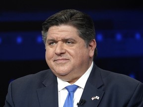 FILE - Illinois Gov. JB Pritzker participates in a debate with Republican gubernatorial challenger, state Sen. Darren Bailey, at the WGN9 studios, Oct. 18, 2022, in Chicago. Crisis pregnancy centers, which often pop up near abortion facilities to offer information about alternatives to the procedure, face penalties if they disseminate misleading or untruthful information after action by Pritzker on Thursday, July 27, 2023.