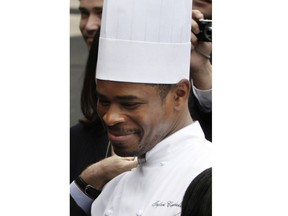 FILE - White House Chef Tafari Campbell smiles Nov. 6, 2008, on the South Lawn of the White House in Washington. Campbell, an employee of former President Barack Obama, has drowned near the couple's home on Martha's Vineyard. Massachusetts State Police confirmed that the paddleboarder whose body was recovered from Edgartown Great Pond on Monday, July 24, 2023 was Tafari Campbell, of Dumfries, Virginia.