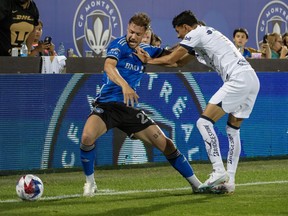 <CF Montreal hosts DC United on Wednesday looking to advance in the Leagues Cup and secure a favourable Round of 32 matchup in the process. Pumas UNAM's Jorge Ruvalcaba (17) pushes CF Montreal's Gabriele Corbo (25) during the second half of a Leagues Cup soccer match in Montreal, Saturday, July 22, 2023.