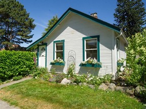 The small waterfront cottage at 3690 Cameron (at Alma) in Vancouver was built for $1,000 in 1925.