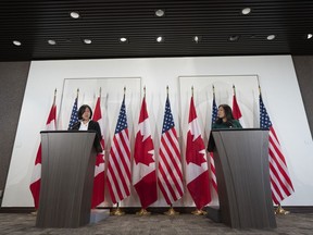 International Trade Minister Mary Ng, right, and U.S. Trade Representative Katherine Tai speak during a joint news conference in Ottawa, Thursday, May 5, 2022. Tai is urging her Canadian counterpart to abandon plans for a digital services tax and to allow U.S. home shopping programming to operate north of the border.THE CANADIAN PRESS/Adrian Wyld