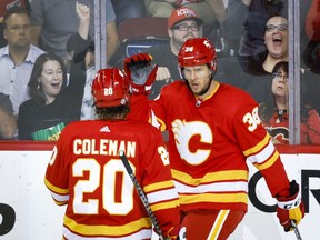 The Flames have signed former coach Darryl Sutter's son Brett to a minor-league contract extension.THE CANADIAN PRESS/Jeff McIntosh