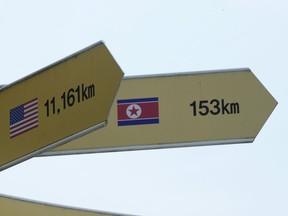 Destination signs to North Korea's capital Pyongyang and the United States are seen at the Imjingak Pavilion in Paju, South Korea, near the border with North Korea, Thursday, July 20, 2023. North Korea wasn't responding Thursday to U.S. attempts to discuss the American soldier who bolted across the heavily armed border and whose prospects for a quick release are unclear at a time of high military tensions and inactive communication channels.