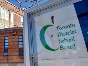 A Toronto District School Board sign is shown in front of a high school in Toronto on Tuesday, Jan. 30, 2018.