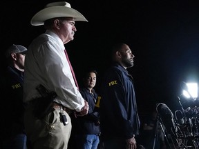 FILE - San Jacinto County Sheriff Greg Capers, left, and FBI assistant Special Agent in Charge Jimmy Paul speak to the media during a news conference announcing the arrest of murder suspect Francisco Oropeza on Tuesday, May 2, 2023 in Cleveland, Texas. Law enforcement officials captured Oropeza on Tuesday night at a home near Houston, ending a four-day manhunt for a suspect who police believe fled after a mass shooting that left five dead.
